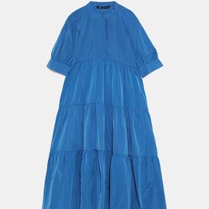 Dress with voluminous sleeves